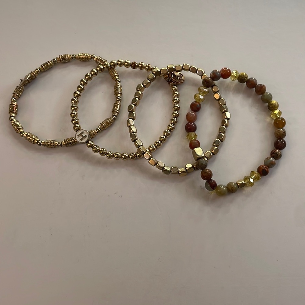 Assorted gold and bead bracelets